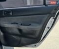 Сірий Міцубісі Lancer, об'ємом двигуна 1.58 л та пробігом 246 тис. км за 4300 $, фото 17 на Automoto.ua
