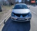 Серый Мицубиси Лансер, объемом двигателя 1.6 л и пробегом 291 тыс. км за 3700 $, фото 1 на Automoto.ua