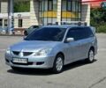 Серый Мицубиси Лансер, объемом двигателя 1.58 л и пробегом 246 тыс. км за 4300 $, фото 1 на Automoto.ua