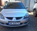Сірий Міцубісі Lancer, об'ємом двигуна 1.6 л та пробігом 262 тис. км за 3900 $, фото 1 на Automoto.ua
