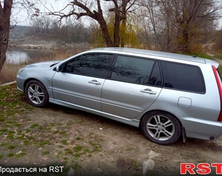 Серый Мицубиси Лансер, объемом двигателя 2 л и пробегом 352 тыс. км за 3950 $, фото 3 на Automoto.ua