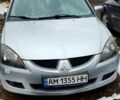 Сірий Міцубісі Lancer, об'ємом двигуна 2 л та пробігом 120 тис. км за 4200 $, фото 1 на Automoto.ua