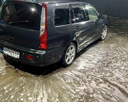 Серый Мицубиси Лансер, объемом двигателя 1.6 л и пробегом 234 тыс. км за 2500 $, фото 2 на Automoto.ua