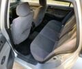 Сірий Міцубісі Lancer, об'ємом двигуна 1.6 л та пробігом 252 тис. км за 1999 $, фото 4 на Automoto.ua