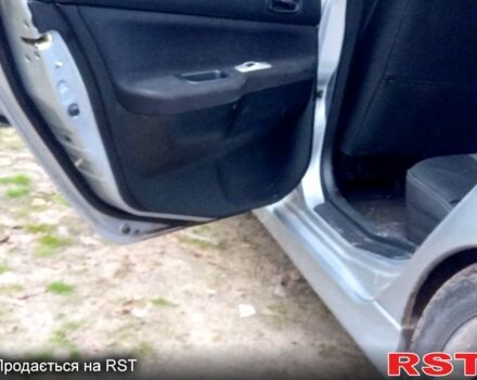 Серый Мицубиси Лансер, объемом двигателя 2 л и пробегом 352 тыс. км за 3950 $, фото 12 на Automoto.ua