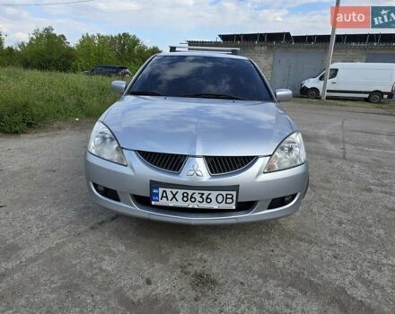 Сірий Міцубісі Lancer, об'ємом двигуна 1.6 л та пробігом 244 тис. км за 4300 $, фото 2 на Automoto.ua