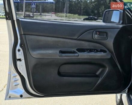 Сірий Міцубісі Lancer, об'ємом двигуна 1.58 л та пробігом 246 тис. км за 4300 $, фото 11 на Automoto.ua