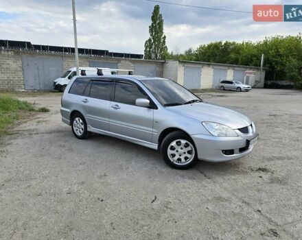 Сірий Міцубісі Lancer, об'ємом двигуна 1.6 л та пробігом 244 тис. км за 4300 $, фото 3 на Automoto.ua