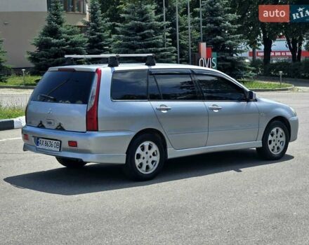Сірий Міцубісі Lancer, об'ємом двигуна 1.58 л та пробігом 246 тис. км за 4300 $, фото 6 на Automoto.ua