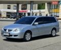 Сірий Міцубісі Lancer, об'ємом двигуна 1.58 л та пробігом 246 тис. км за 4300 $, фото 4 на Automoto.ua