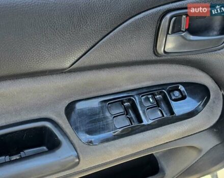 Сірий Міцубісі Lancer, об'ємом двигуна 1.58 л та пробігом 246 тис. км за 4300 $, фото 10 на Automoto.ua