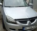 Сірий Міцубісі Lancer, об'ємом двигуна 1.6 л та пробігом 250 тис. км за 2500 $, фото 1 на Automoto.ua