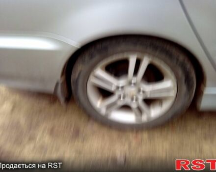 Серый Мицубиси Лансер, объемом двигателя 2 л и пробегом 352 тыс. км за 3950 $, фото 7 на Automoto.ua