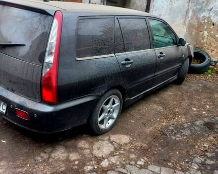 Серый Мицубиси Лансер, объемом двигателя 1.6 л и пробегом 234 тыс. км за 2500 $, фото 9 на Automoto.ua