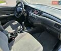 Сірий Міцубісі Lancer, об'ємом двигуна 1.58 л та пробігом 246 тис. км за 4300 $, фото 26 на Automoto.ua