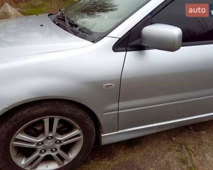 Сірий Міцубісі Lancer, об'ємом двигуна 2 л та пробігом 352 тис. км за 3950 $, фото 4 на Automoto.ua