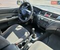 Сірий Міцубісі Lancer, об'ємом двигуна 1.58 л та пробігом 246 тис. км за 4300 $, фото 25 на Automoto.ua