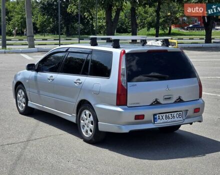 Сірий Міцубісі Lancer, об'ємом двигуна 1.58 л та пробігом 246 тис. км за 4300 $, фото 5 на Automoto.ua