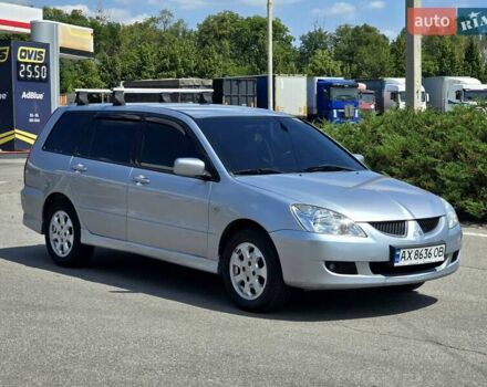Сірий Міцубісі Lancer, об'ємом двигуна 1.58 л та пробігом 246 тис. км за 4300 $, фото 7 на Automoto.ua