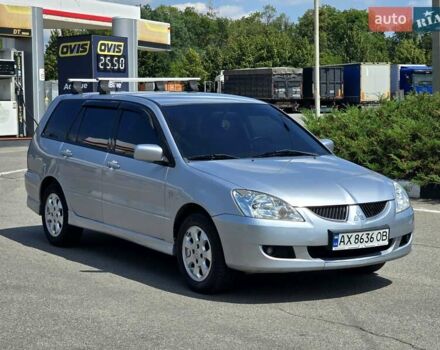 Сірий Міцубісі Lancer, об'ємом двигуна 1.58 л та пробігом 246 тис. км за 4300 $, фото 8 на Automoto.ua