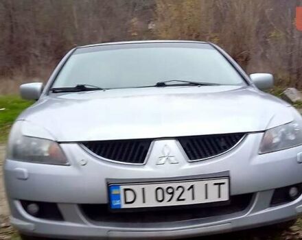 Сірий Міцубісі Lancer, об'ємом двигуна 2 л та пробігом 352 тис. км за 3950 $, фото 13 на Automoto.ua