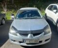 Сірий Міцубісі Lancer, об'ємом двигуна 1.58 л та пробігом 210 тис. км за 3500 $, фото 1 на Automoto.ua