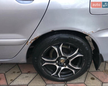 Серый Мицубиси Лансер, объемом двигателя 1.58 л и пробегом 240 тыс. км за 3500 $, фото 5 на Automoto.ua