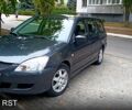 Сірий Міцубісі Lancer, об'ємом двигуна 1.6 л та пробігом 360 тис. км за 4100 $, фото 1 на Automoto.ua