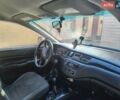 Серый Мицубиси Лансер, объемом двигателя 1.6 л и пробегом 500 тыс. км за 3100 $, фото 1 на Automoto.ua