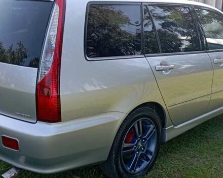 Серый Мицубиси Лансер, объемом двигателя 1.58 л и пробегом 231 тыс. км за 4500 $, фото 8 на Automoto.ua