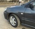 Сірий Міцубісі Lancer, об'ємом двигуна 0.16 л та пробігом 344 тис. км за 4015 $, фото 4 на Automoto.ua