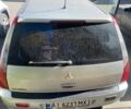 Серый Мицубиси Лансер, объемом двигателя 1.58 л и пробегом 210 тыс. км за 3500 $, фото 4 на Automoto.ua