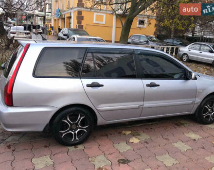 Серый Мицубиси Лансер, объемом двигателя 1.58 л и пробегом 240 тыс. км за 3500 $, фото 1 на Automoto.ua