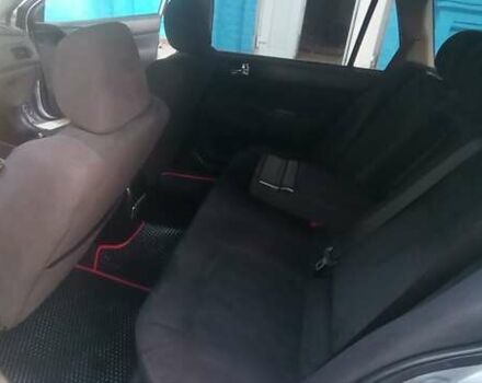 Серый Мицубиси Лансер, объемом двигателя 1.58 л и пробегом 231 тыс. км за 4500 $, фото 2 на Automoto.ua