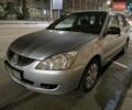 Мицубиси Лансер 2004 в Первомайск на Automoto.ua Серый Мицубиси Лансер, объемом двигателя 1.6 л и пробегом 500 тыс. км за 3300 $, фото 1 на Automoto.ua