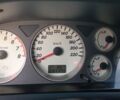 Серый Мицубиси Лансер, объемом двигателя 1.58 л и пробегом 231 тыс. км за 4100 $, фото 13 на Automoto.ua