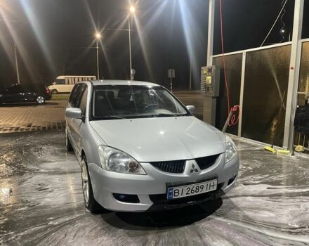 Сірий Міцубісі Lancer, об'ємом двигуна 1.6 л та пробігом 396 тис. км за 3250 $, фото 1 на Automoto.ua
