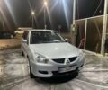 Сірий Міцубісі Lancer, об'ємом двигуна 1.6 л та пробігом 396 тис. км за 3250 $, фото 1 на Automoto.ua
