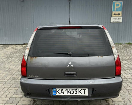 Серый Мицубиси Лансер, объемом двигателя 1.6 л и пробегом 667 тыс. км за 2999 $, фото 3 на Automoto.ua