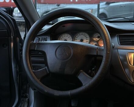 Серый Мицубиси Лансер, объемом двигателя 1.6 л и пробегом 220 тыс. км за 3999 $, фото 13 на Automoto.ua