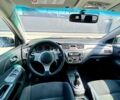 Серый Мицубиси Лансер, объемом двигателя 1.58 л и пробегом 138 тыс. км за 4000 $, фото 7 на Automoto.ua