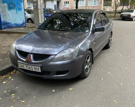 Сірий Міцубісі Lancer, об'ємом двигуна 1.6 л та пробігом 280 тис. км за 4200 $, фото 1 на Automoto.ua