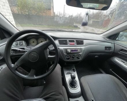 Сірий Міцубісі Lancer, об'ємом двигуна 1.6 л та пробігом 396 тис. км за 3250 $, фото 7 на Automoto.ua