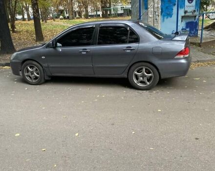 Сірий Міцубісі Lancer, об'ємом двигуна 1.6 л та пробігом 280 тис. км за 4200 $, фото 6 на Automoto.ua