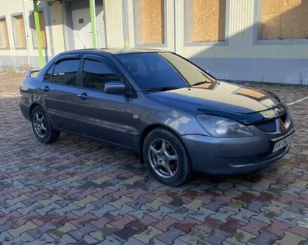 Сірий Міцубісі Lancer, об'ємом двигуна 1.6 л та пробігом 280 тис. км за 4200 $, фото 4 на Automoto.ua