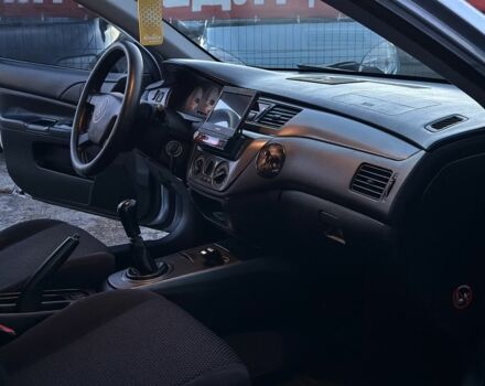 Серый Мицубиси Лансер, объемом двигателя 1.6 л и пробегом 220 тыс. км за 3999 $, фото 10 на Automoto.ua