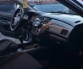 Серый Мицубиси Лансер, объемом двигателя 1.6 л и пробегом 220 тыс. км за 3999 $, фото 10 на Automoto.ua