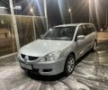 Сірий Міцубісі Lancer, об'ємом двигуна 1.6 л та пробігом 396 тис. км за 3250 $, фото 4 на Automoto.ua