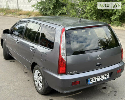 Сірий Міцубісі Lancer, об'ємом двигуна 1.6 л та пробігом 240 тис. км за 4600 $, фото 17 на Automoto.ua