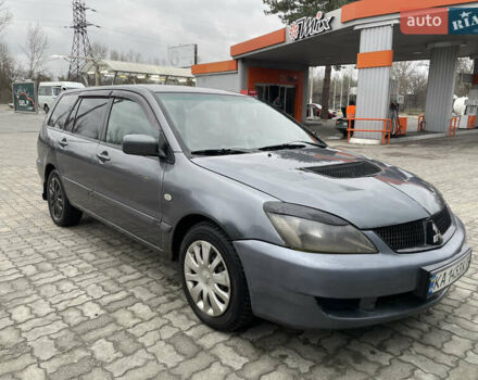 Серый Мицубиси Лансер, объемом двигателя 1.6 л и пробегом 667 тыс. км за 2999 $, фото 1 на Automoto.ua